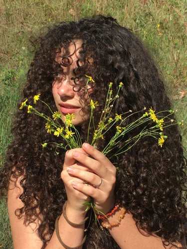 Moisture 101: Hydration Tips Every Curly Girl Needs