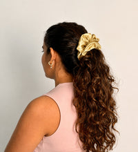wearing a satin scrunchie on curls